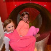closeup shot of two little girls smiling