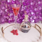 Chambord Royale bottle and a glass with berries